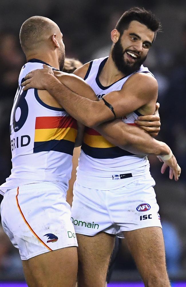 Adelaide’s Cam Ellis-Yolmen and Wayne Milera celebrate a goal against Carlton in Round 23. Picture: Quinn Rooney/Getty Images