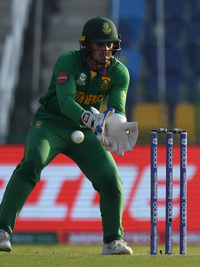 Wicketkeeper de Kock watches a sliced delivery escape his grasp.