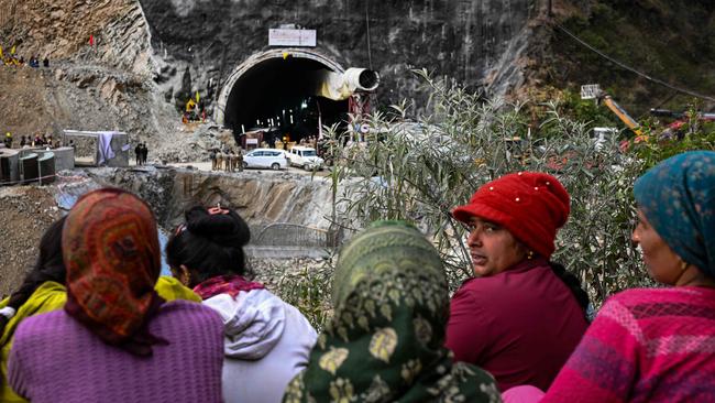 Villagers and locals from Uttarakhand watch on as the rescue operation continued. Picture: Sajjad Hussain /AFP