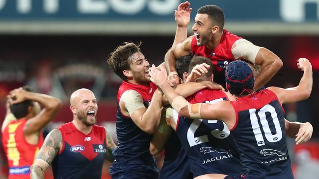 The Demons celebrate their thrilling win. Pic: Getty Images