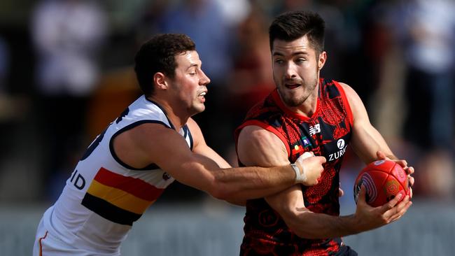 Crow Luke Brown tackles Melbourne’s Alex Neal-Bullen before leaving the field with concussion. Picture: Michael Willson/AFL Media/Getty Images