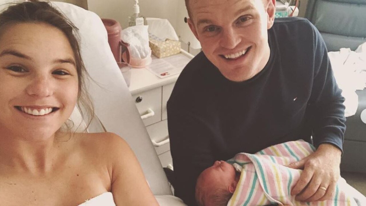 Teigan and Alex McKinnon with their new daughter Harriet Anne.