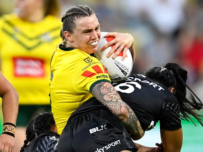 TOWNSVILLE, AUSTRALIA - OCTOBER 14: Julia Robinson of the Jillaroos is tackled during the Womens Pacific Championship match between the Australia Jillaroos and New Zealand Kiwi Ferns at Queensland Country Bank Stadium on October 14, 2023 in Townsville, Australia. (Photo by Ian Hitchcock/Getty Images)