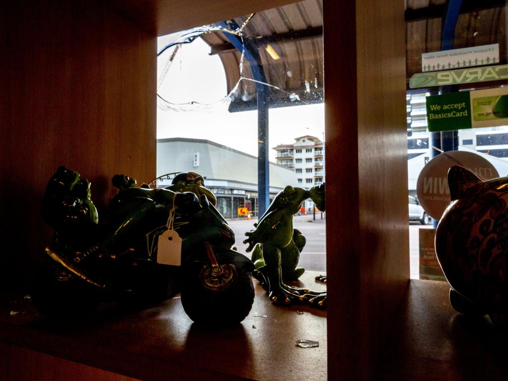 Pieces of glass lay on the shopfront shelves of Dawn Sanders longtime business Warehouse 73 Emporium. Picture: Floss Adams.