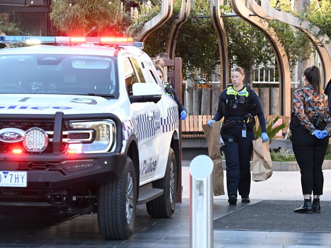 Police remove evidence from the scene. Picture: Josie Hayden