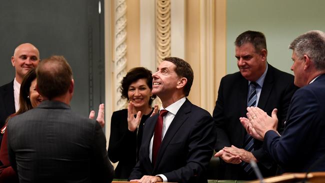 Queensland Treasurer Cameron Dick is congratulated by colleagues after he delivered his budget speech at Parliament House. This is Mr Dick's second state budget. Picture: NCA NewsWire / Dan Peled