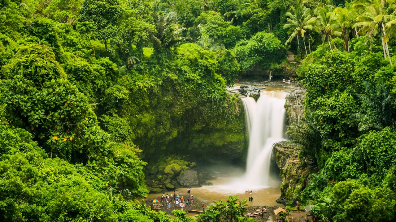 The Tegenungan Waterfall near Ubud in Bali, Indonesia. The island’s mix of cultural power, natural beauty and affordability makes it a top travel destination for Australian tourists. Picture: iStock