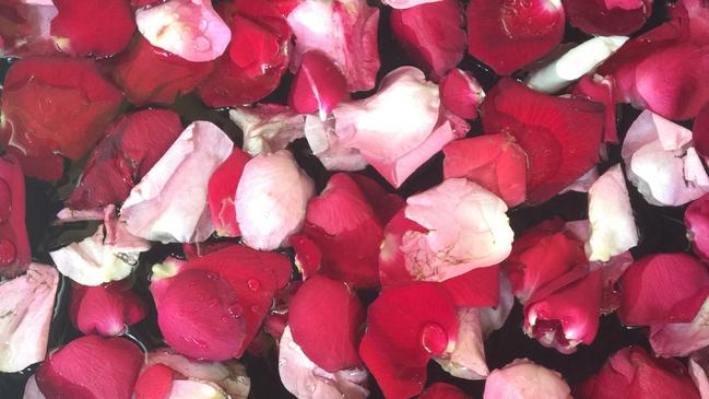 The fragrance from floating rose petals can evoke memories of Bali. Picture: Susan Kurosawa