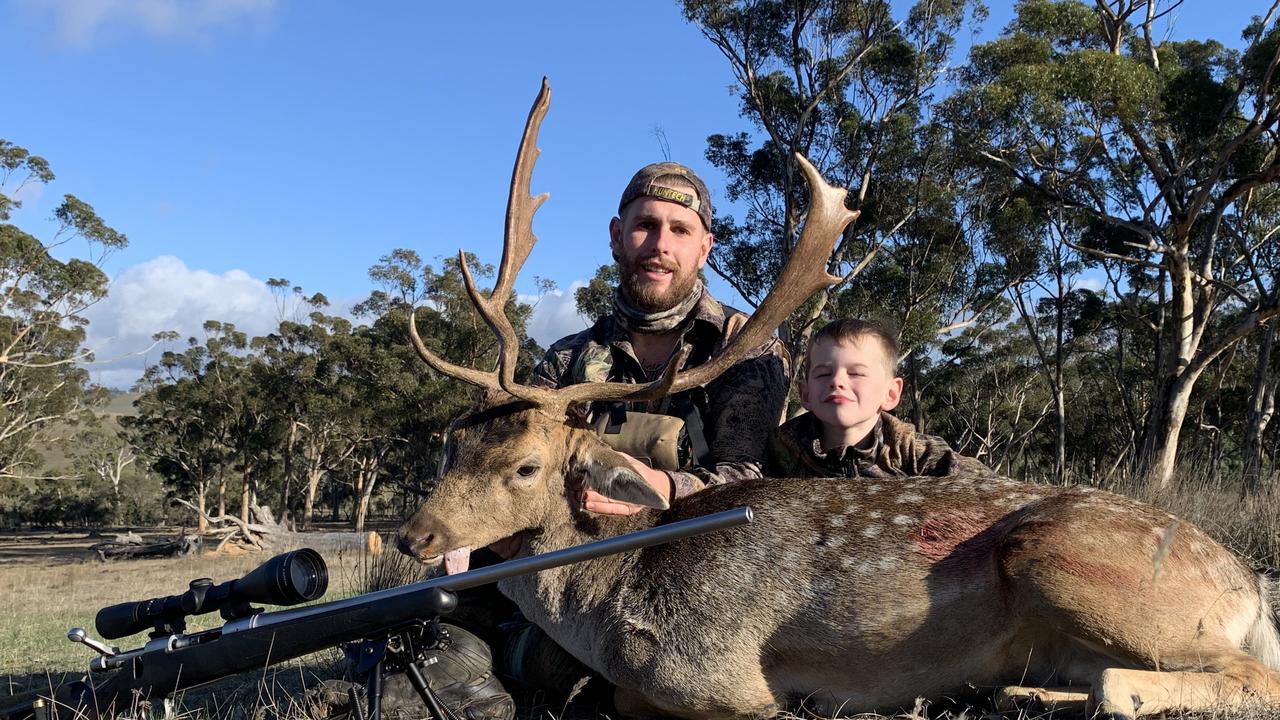 SA based hunter Zach Williams with his stepson Aidan, 7, on a hunting trip with a deer. Picture: Supplied