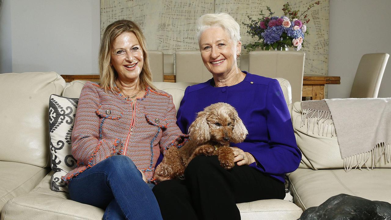 Jackie Stricker-Phelps and Dr Kerryn Phelps with their dog Lulu. Picture: John Appleyard