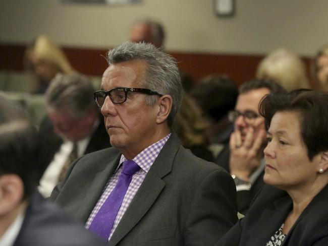 Gavin Cox, left, who was injured during an illusion by David Copperfield watches on in a Las Vegas court. Picture: Michael Quine/Las Vegas Review-Journal via AP