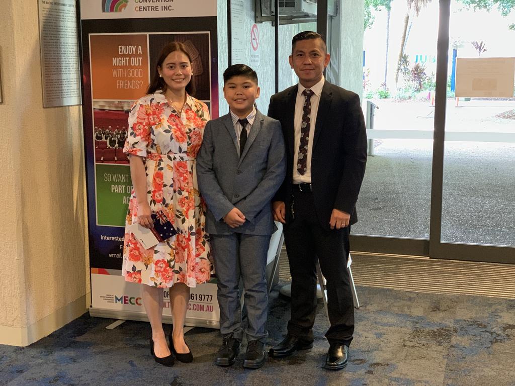 New Aussies (from left) Valerie, Shaun Khaleb and Cresenciano Pitogo were sharply dressed for the citizenship ceremony at the MECC on Australia Day, 2022. Wednesday, January 26, 2022. Mackay Australia Day 2022. Mackay Citizenship Ceremony 2022. Picture: Duncan Evans