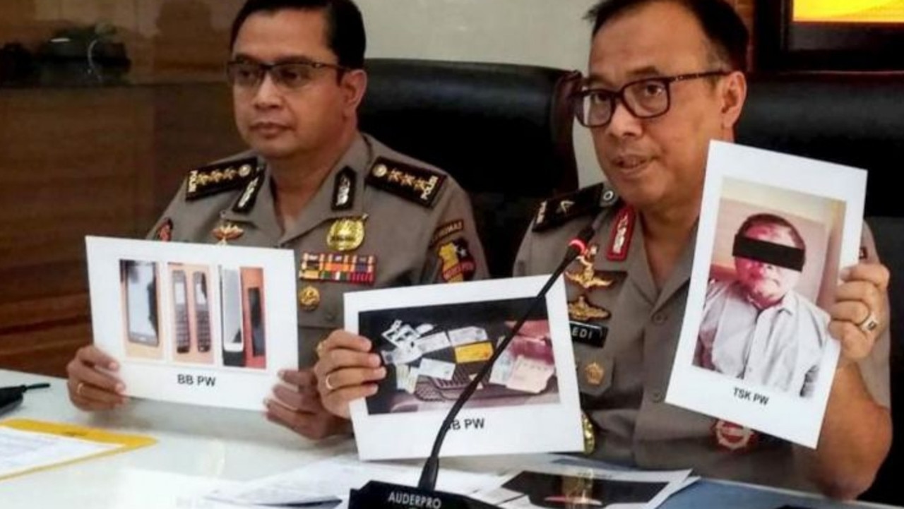 Photographs of JI leader Para Wijayanto and various seized items are shown at a press conference in Jakarta on July 1, 2019. Picture: AFP