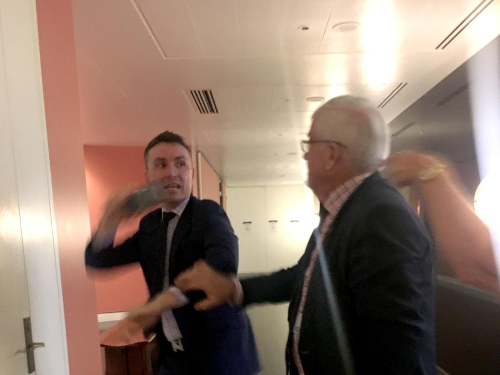 James Ashby and former senator Brian Burston during the clash in Parliament House. Picture: Geoff Chambers / The Australian