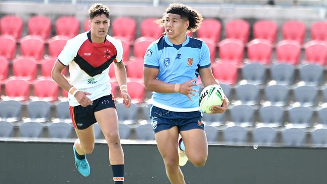 Luke Laulilii breaks clear for NSWCHS in the ASSRL national championships in Redcliffe, July 1, 2023. Picture, John Gass