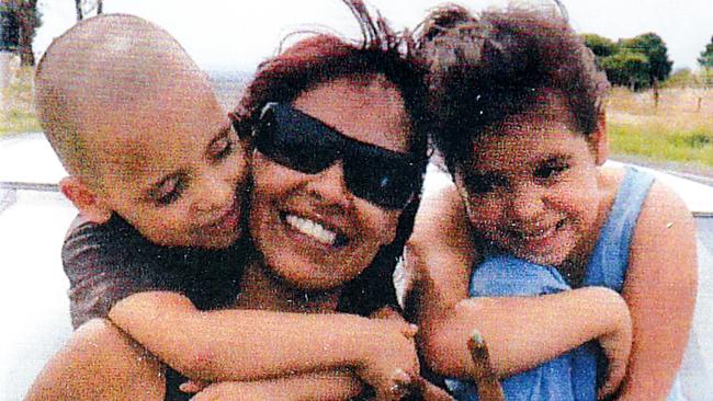 Adeline Yvette Wilson-Rigney with her daughter Amber Rose Rigney, right, and son Korey Lee Mitchell, left.