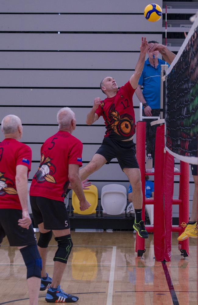 Action as Sparta v the Crippled Wombats in the Pan Pacific Masters Games Volleyball tournament. Picture: Glenn Campbell