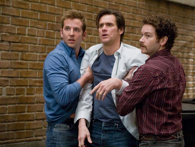 (L-R) Bradley Cooper, Jim Carrey, and Danny Masterson are shown in a scene from 2008 film <i>Yes Man</i>. Picture: AP.