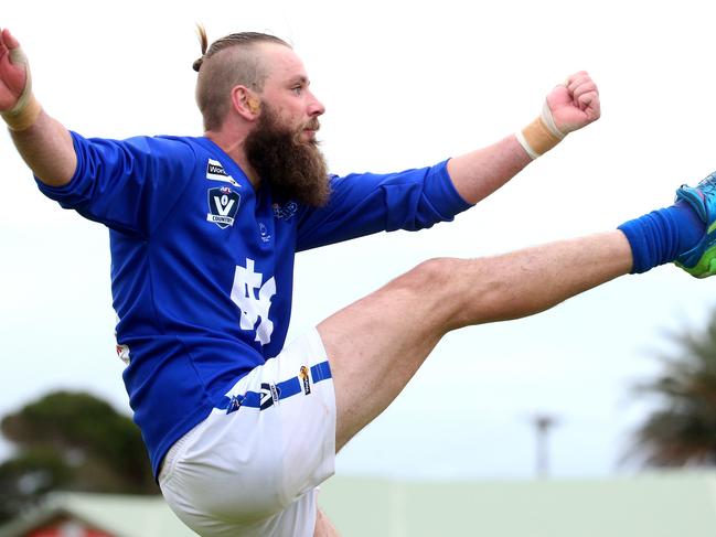 Colin McVeigh boots Hastings forward. He has applied for a clearance to Mornington. Picture: Mark Dadswell