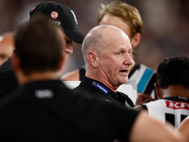 Ken Hinkley speaks to his troops on Saturday night. Picture: Michael Willson/AFL Photos via Getty Images.