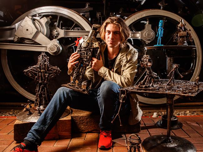 Rockleigh farmer and artist Nathan Modra with some of his SALA Festival work at the National Railway Museum in Port Adelaide. Picture: Matt Turner