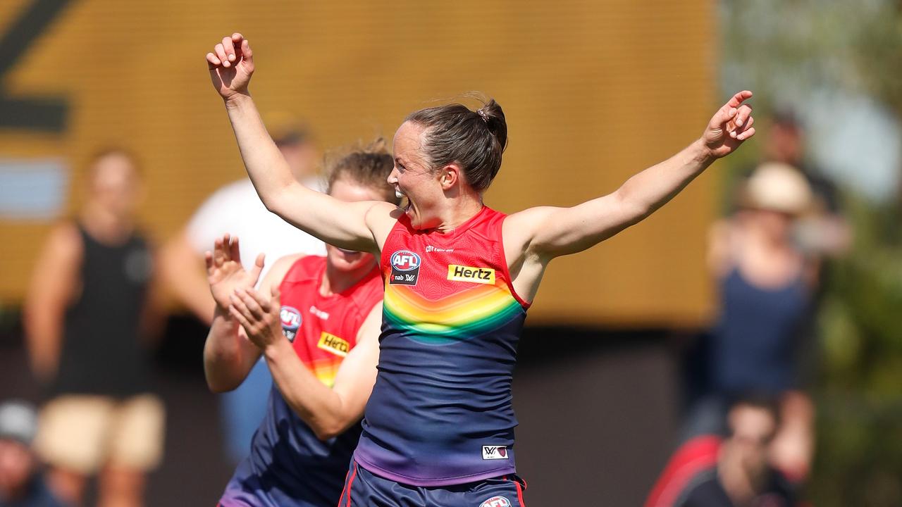 Daisy Pearce celebrates a goal as Melbourne stormed home.