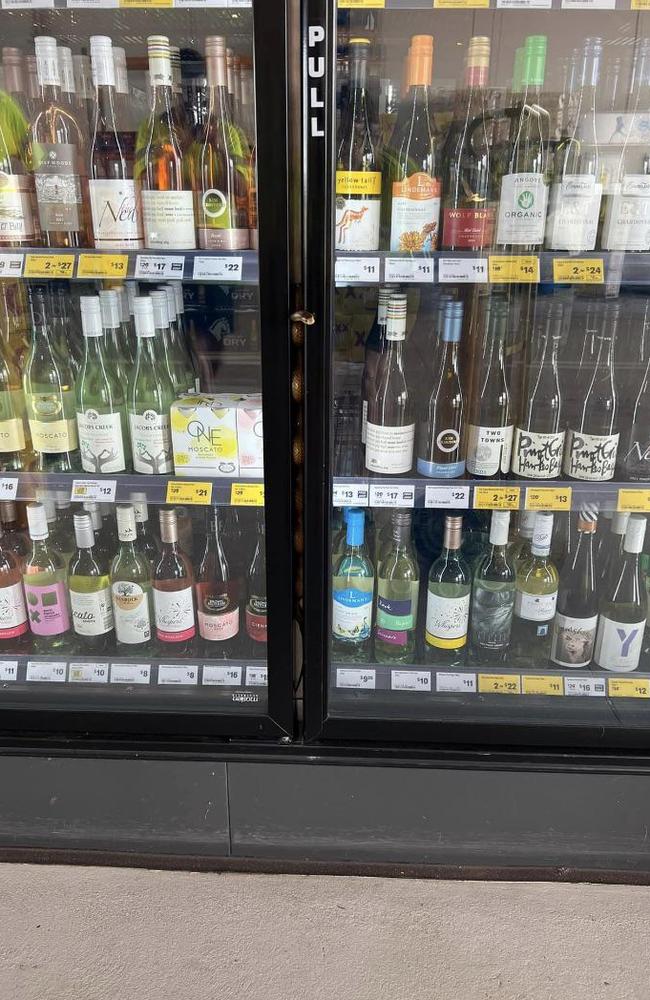 A venomous snake spotted in a Northern Territory bottle shop. Can you see it? Picture: Reddit