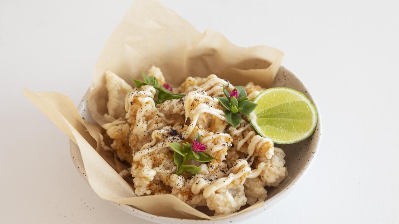 Flying out of the kitchen: The flash fried squid at Manly Boathouse. Picture: Mark Cranitch.