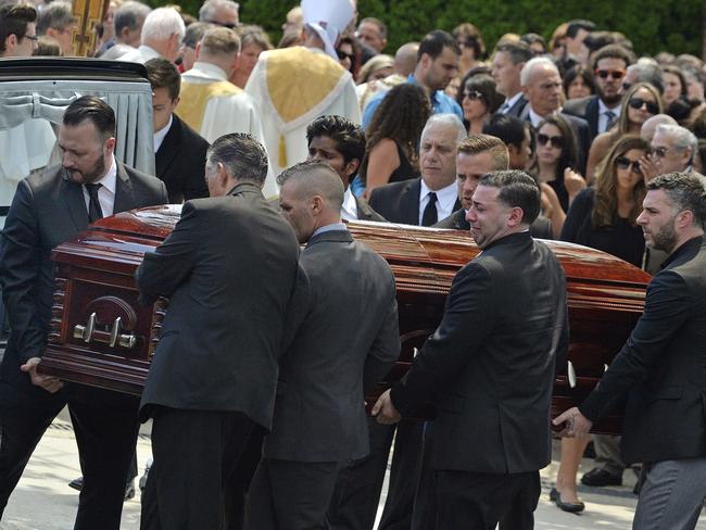 Mourners carry the casket of Karina Vetrano following her funeral on august 6. Source: AP