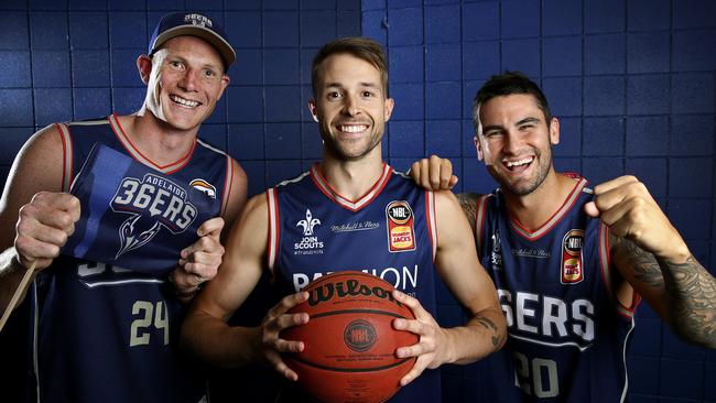 Adelaide 36ers guard Nathan Sobey with Crows ruckman Sam Jacobs and Power star Chad Wingard. Picture; Sarah Reed