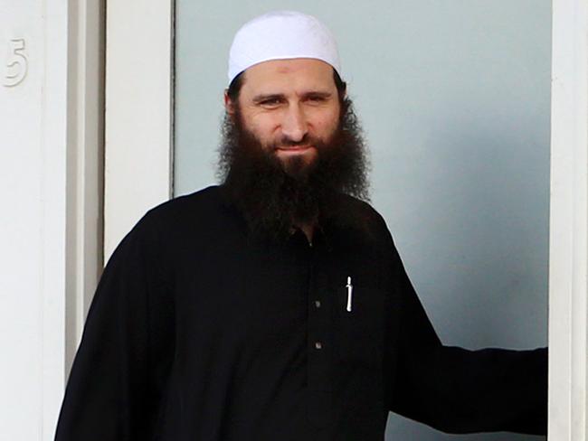 Harun Mehicevic pictured in 2014 outside his Springvale South bookshop.