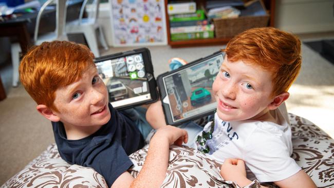 Brothers Tommy and Ollie given iPads during lockdown to keep in touch with friends, but their use is heavily policed by parents. Picture: Mark Stewart