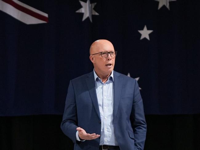 Opposition Leader Peter Dutton will only stand in front of the Australian flag if he becomes Prime Minister. Photo: Peter Dutton Facebook.