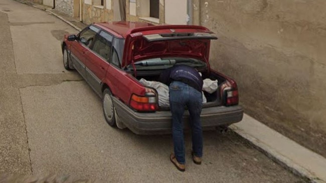 This image helped police investigate a missing person's case in Spain. Pic: Google Maps Street View . A Google street view image of a man loading a large white plastic bag into the boot of his car has led to the arrest of two people on suspicion of murder. Picture Google