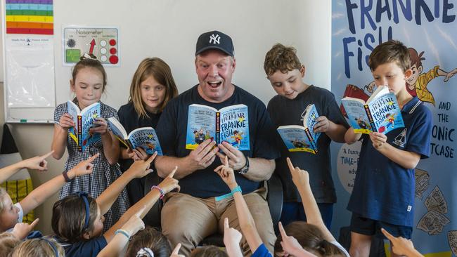 Pete Heliar settles in a school to launch his first kids book, Frankie Fish and the Sonic Suitcase, earlier this year.  Picture: Valeriu Campan