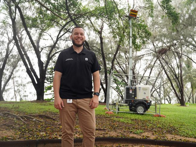 Councilor Brodie Phillips with amber light tower at Saunders Beach. Picture: Supplied