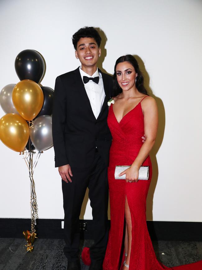 Kate Edwards and Faizi Taylor at Trinity Lutheran College formal at Gold Coast Convention and Exhibition Centre. Photograph : Jason O'Brien