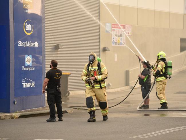 Grafton Fire and Rescue crews were quick to extinguish the flames, along with help from two members of the public who helped hosed the roof down. Photo: Adam Hourigan