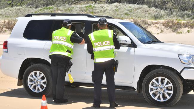 Police also conduct alcohol, drug and speed testing of drivers on beaches where motorists are permitted to drive. Photo: John McCutcheon