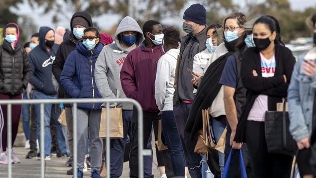 People queue for their Covid jab at Sandown Racecourse. Picture: David Geraghty