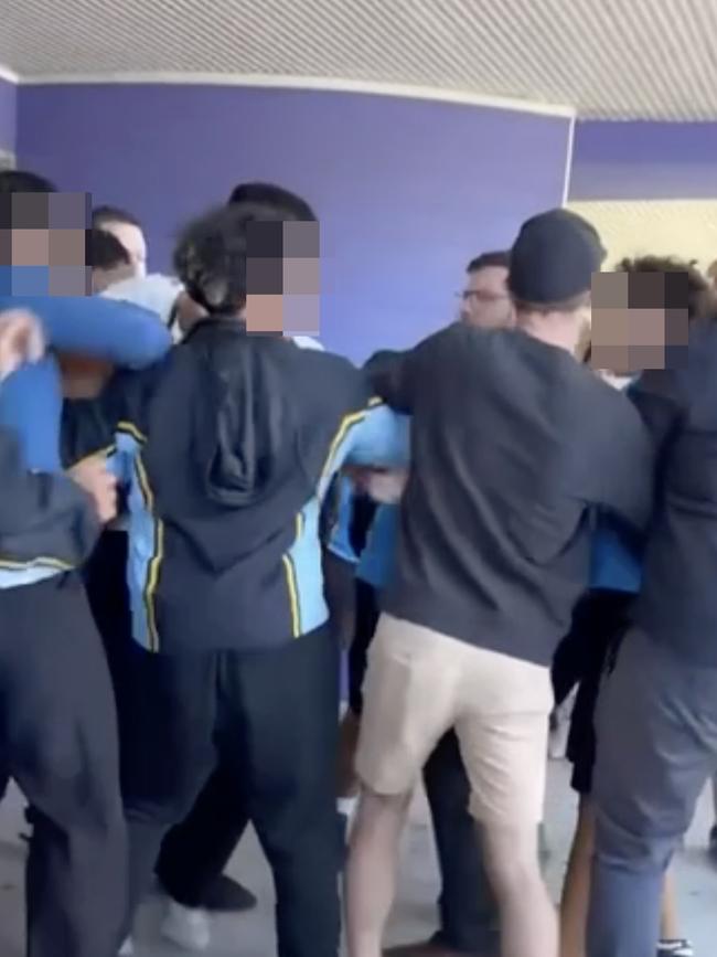 In another incident four male teachers had to separate two rival groups. Picture: Supplied