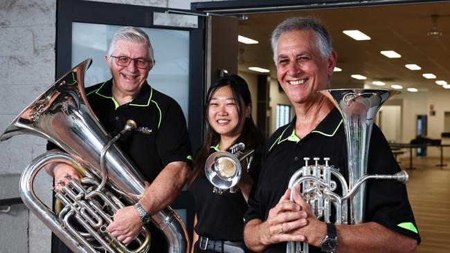 Cairns Brass has sent three of its bands to state competitions in recent weeks, coming back with three first place results. Gary George,Lara Oya and Greg Martin play in the Cairns Brass senior band. Picture: Brendan Radke