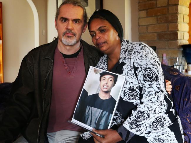 Step father Darron (Darron) Lehmann and Mother Hirut Woldemicheal (Woldemicheal) Seboka with a recent picture of Nazrawi known as Naz. Further calls for missing Hobart man Nazrawi Woldemicheal (Woldemicheal) 19 to make contact with family or Tasmania Police. Picture: NIKKI DAVIS-JONES