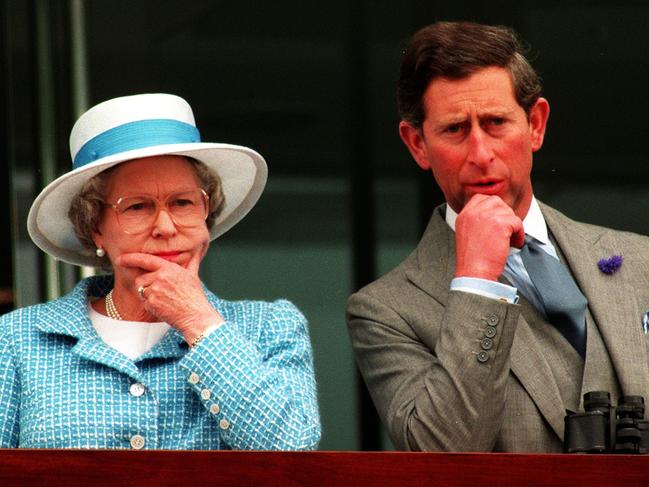 The master and her apprentice — Queen Elizabeth with Prince Charles at the races in 1993.
