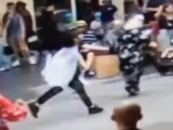 7NEWS has extraordinary video of the moment a good Samaritan used his hip and shoulder to knock down a thug accused of a violent attack in Rundle Mall. Picture: 7NEWS
