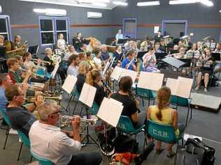 Jeanette Douglas (standing at right of back) - Conductor of Capricornia Winds overseeing rehearsal. Picture: contributed