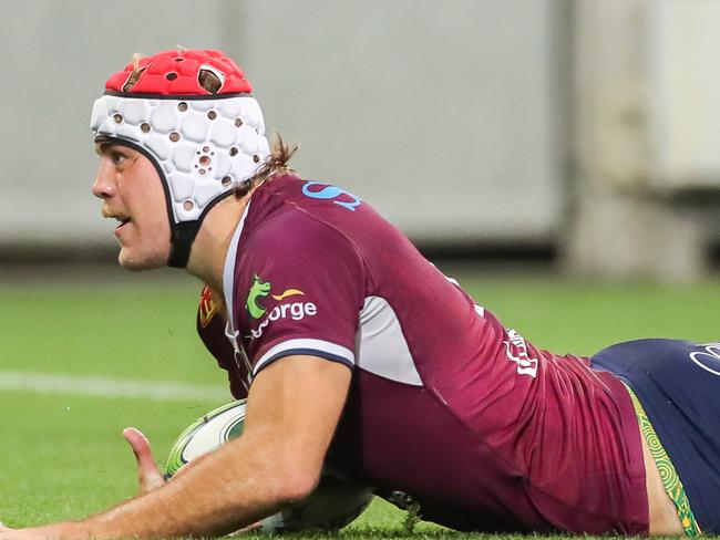 MELBOURNE, AUSTRALIA - APRIL 03: Fraser McReight of the Reds dives to score a try during the Super RugbyAU, round 7 match between the Melbourne Rebels and the Queensland Reds at AAMI Park, on April 03, 2021, in Melbourne, Australia. (Photo by Asanka Ratnayake/Getty Images)