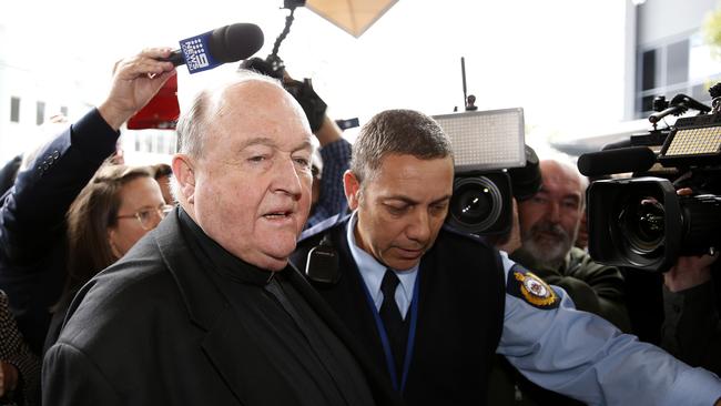 Archbishop Philip Wilson leaves Newcastle Local Court after being sentenced for concealing historical child sexual abuse. Picture: AAP / Darren Pateman