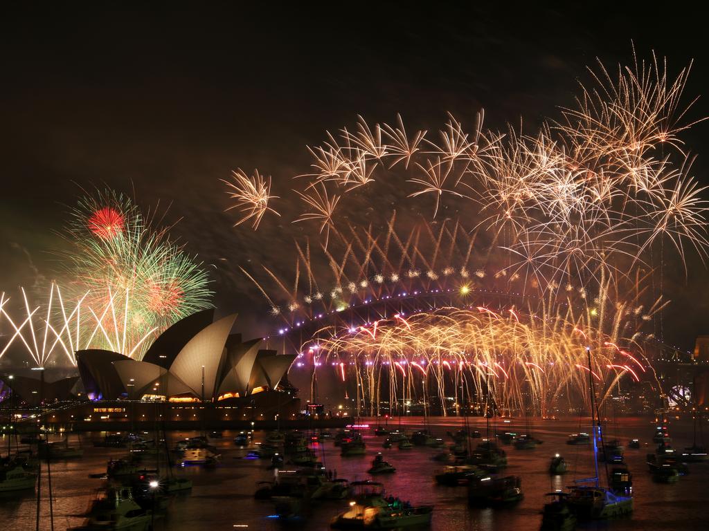 New Year's Eve midnight fireworks over Sydney Harbour as seen from Mrs Macquarie's Chair. Picture: Jonathan Ng