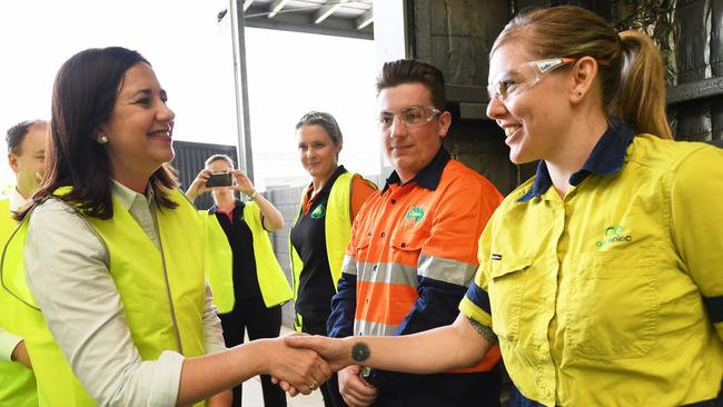 Queensland Premier Annastacia Palaszczuk greets apprentice Kahlyn Pryor as she visits the TAFE Skill Centre at Acacia Ridge. (AAP Image/Tracey Nearmy)